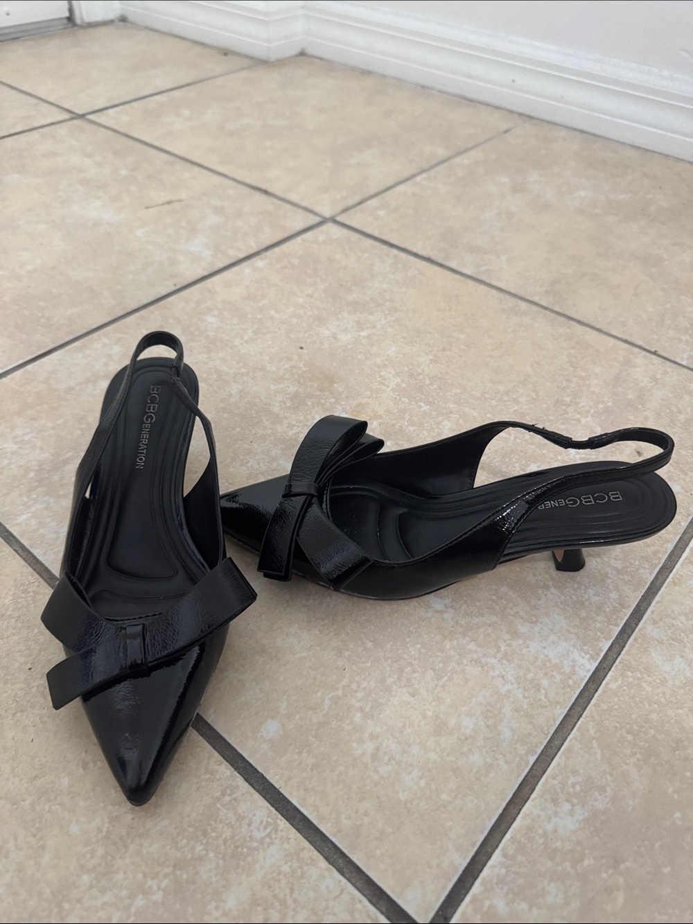 BCBGeneration Black Patent Pointed Slingback Heels with Bow